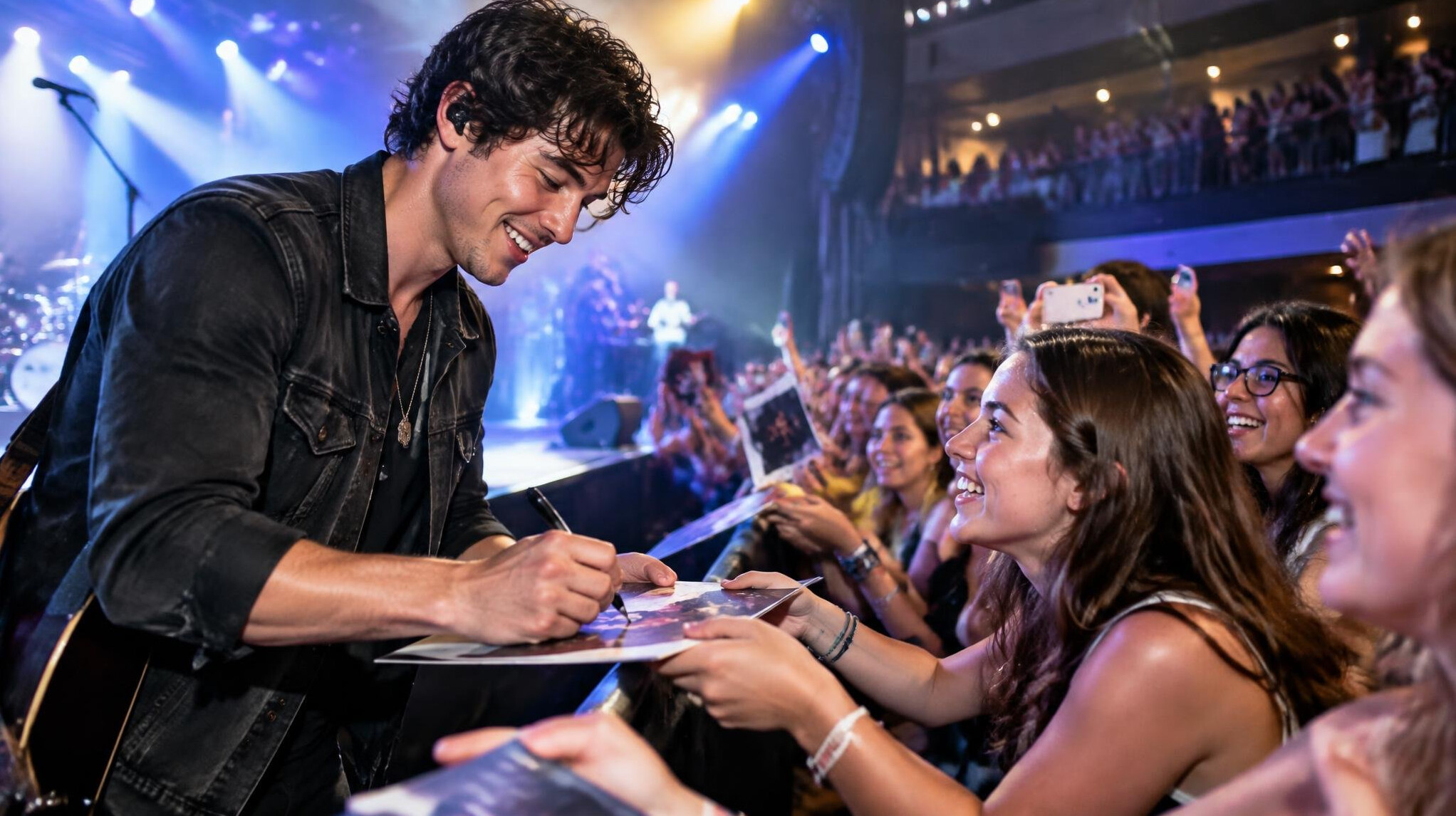 musician signing autographs